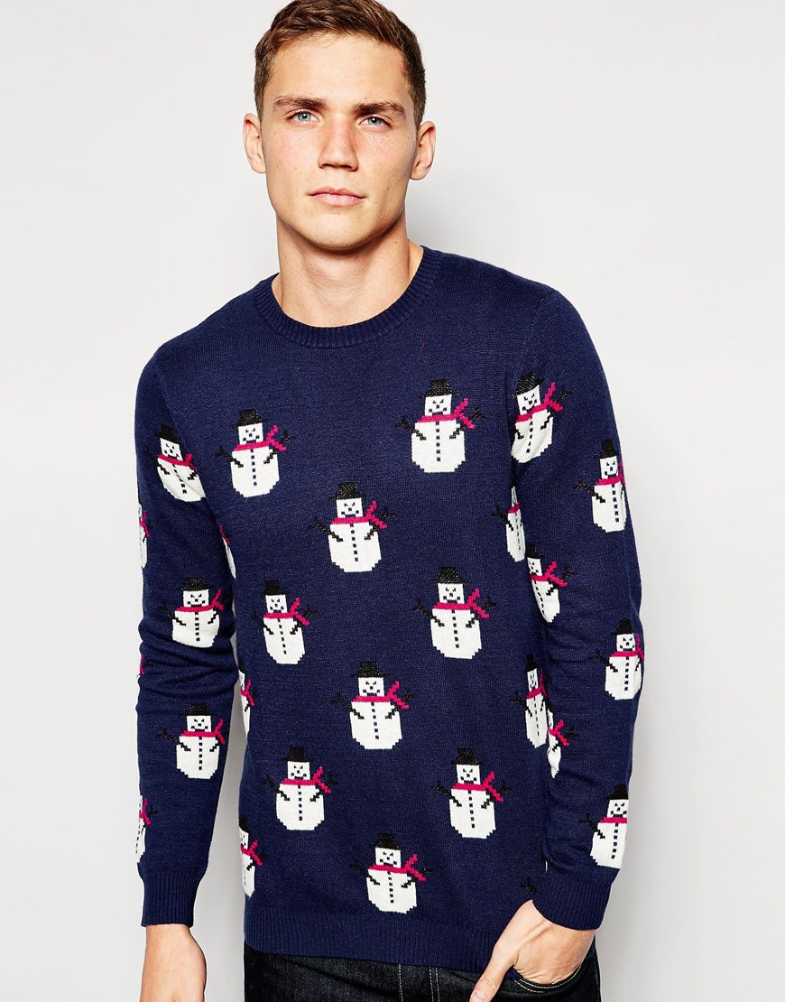 ASOS - Pull de Noël en cachemire, motifs « bonhomme de neige » 52,99 €